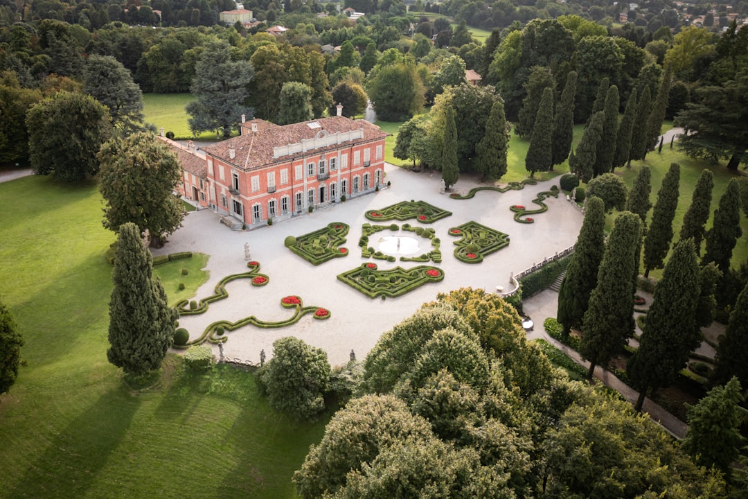 Formal estate garden with herbaceous borders and stone path